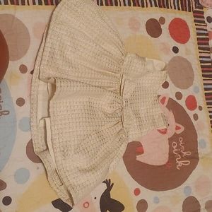 Newborn dress. Carter's. Shimmering Gold in color